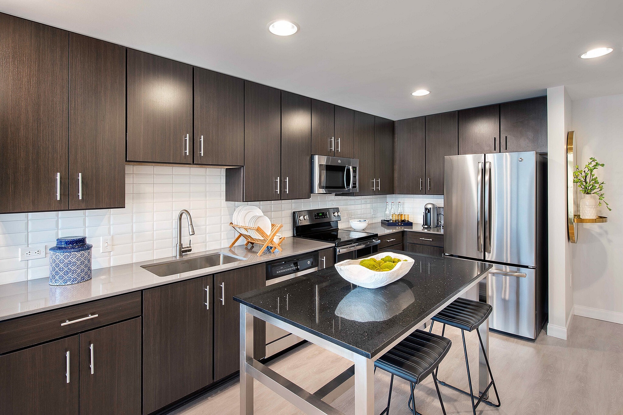 Modern Kitchen Featuring Stainless Steel Appliances - 360 Market Square