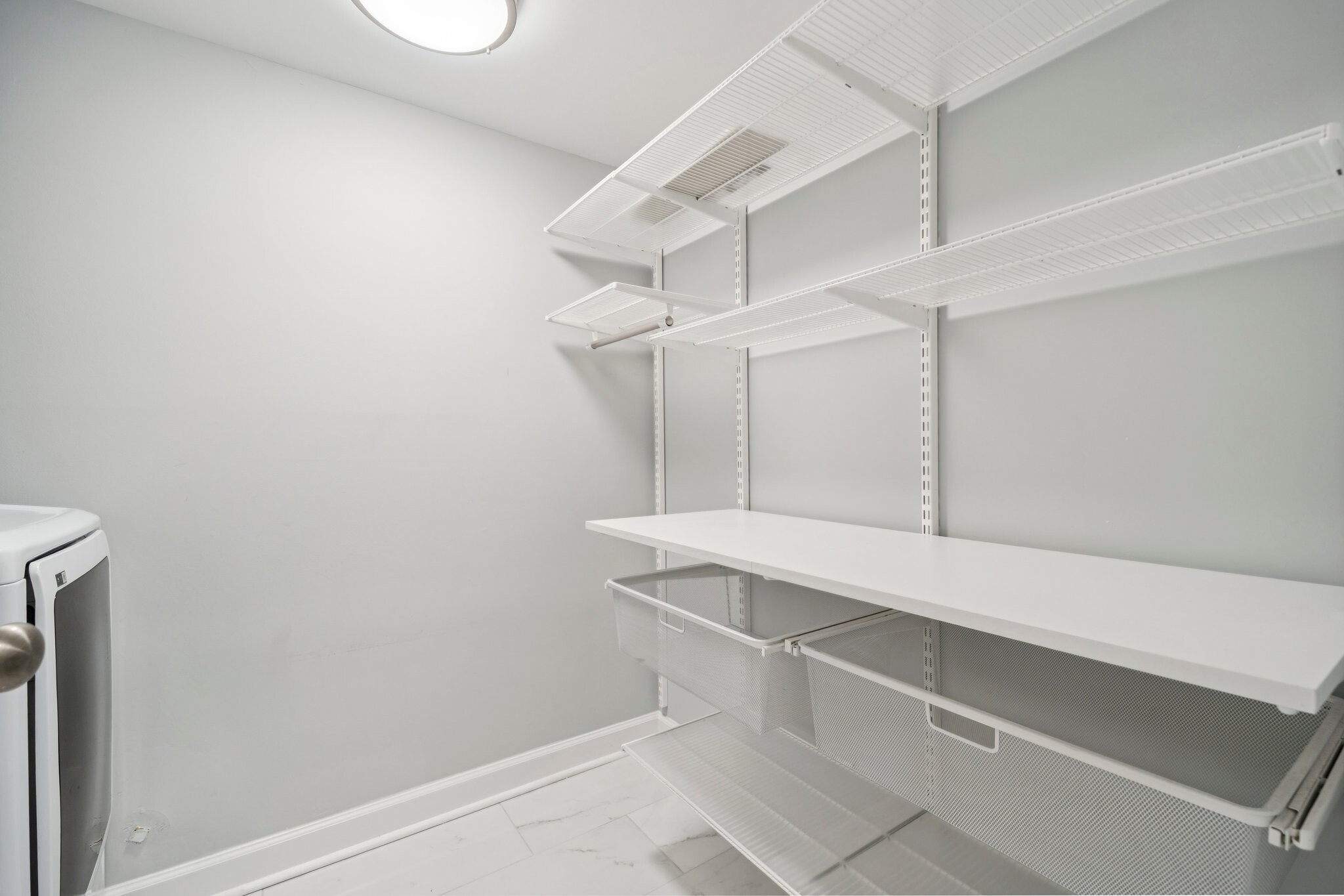 Laundry Room with Shelving - 8323 Cliffside Dr