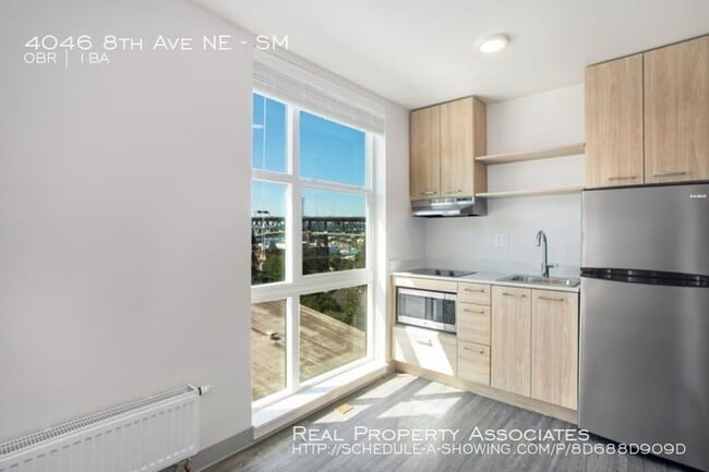 Building Photo - 4046 8th Ave NE