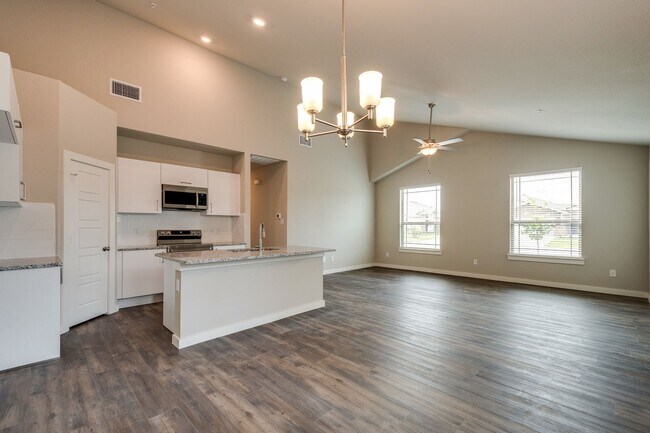 Building Photo - GORGEOUS 3 BEDROOM FOUR PLEX LOCATED IN MI...