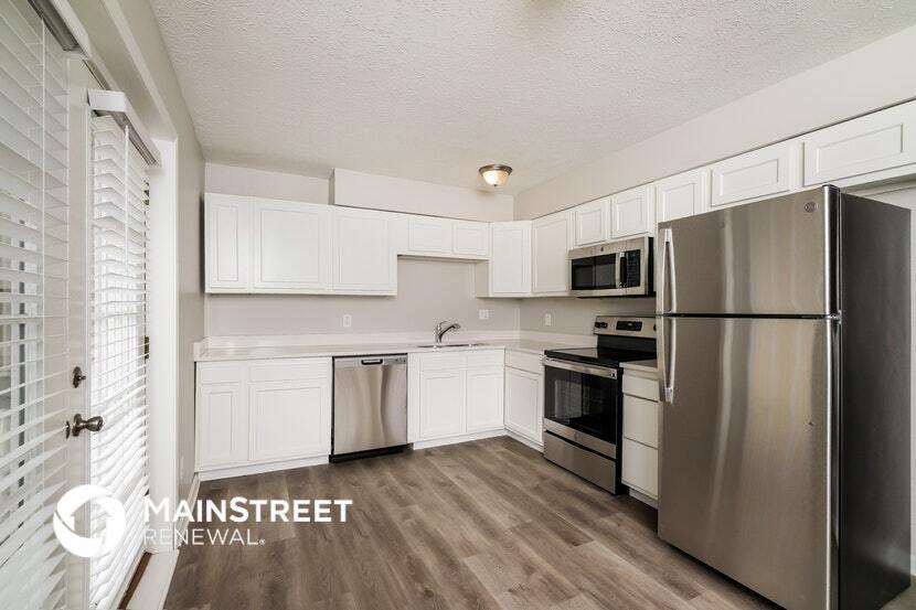 Building Photo - 1303 Woodcreek Dr