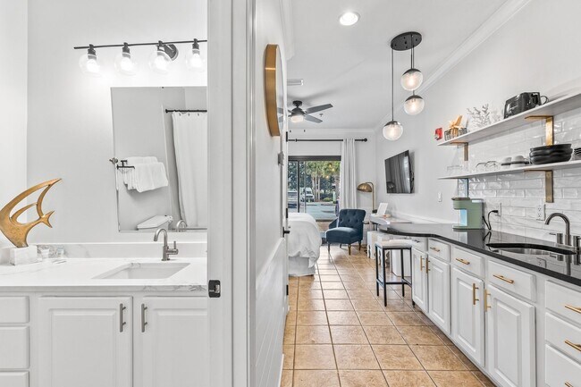 Building Photo - Available now.  Cute Furnished Studio Cond...