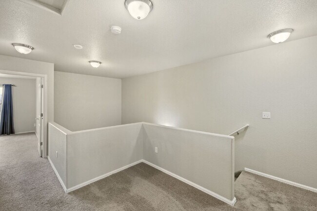 Building Photo - "Beautiful Townhome 3-Bedroom  2.5 Baths no carpet home, just 7 minutes from Fort Carson!"