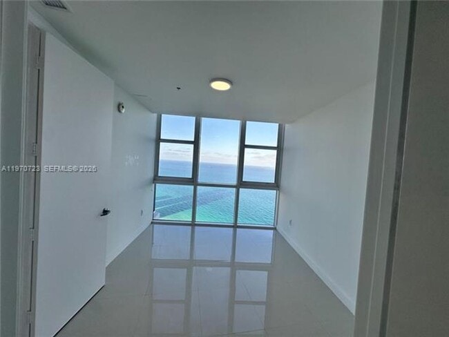 Building Photo - 18201 Collins Ave