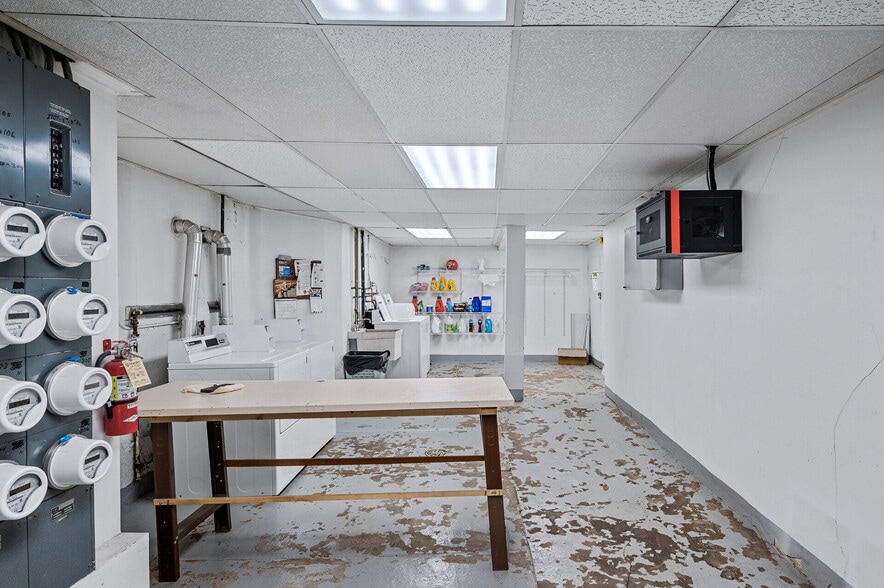 Shared coin-op laundry. - 1705 Stevens Ave