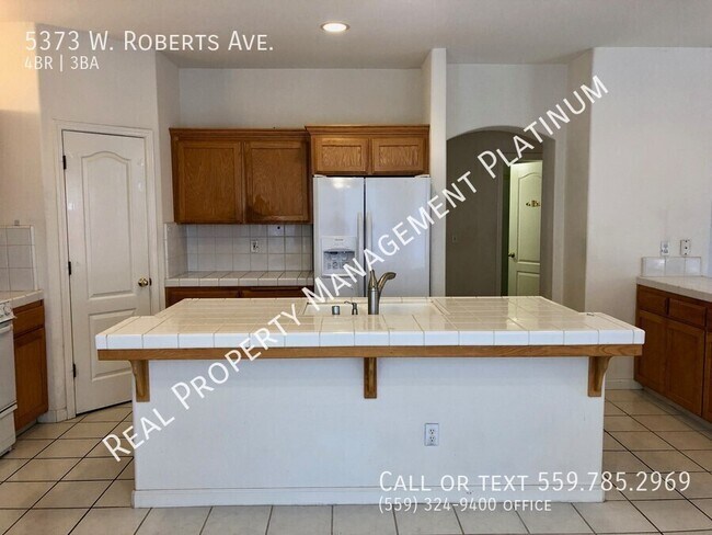 Building Photo - 5373 W Roberts Ave