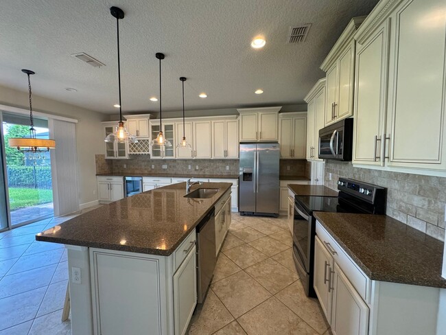 Building Photo - VillageWalk at Lake Nona ~ Gorgeous 4 bed/3 bath Executive Home!