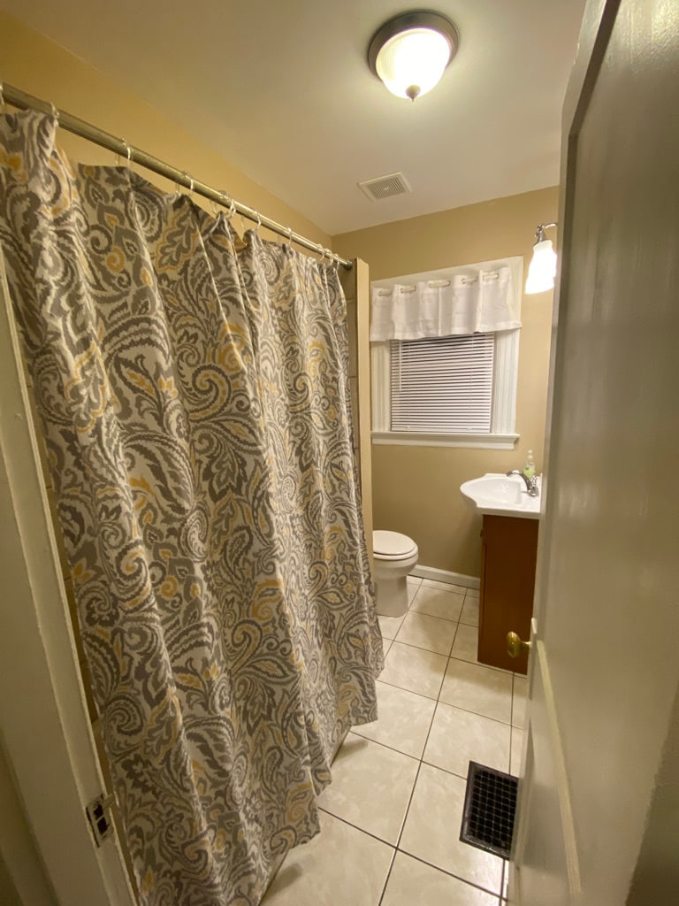 Full bath with tub and shower. - 136 Fairfield Ave