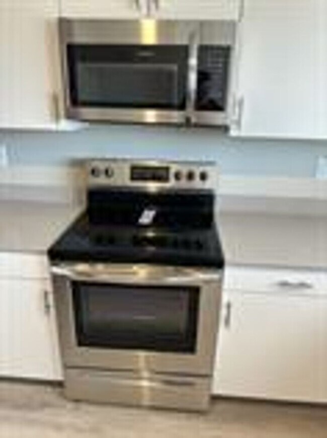 Building Photo - Red Vista Condos!