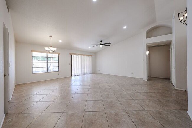 Building Photo - Welcome to this stunning 4-bedroom, 2-bath...