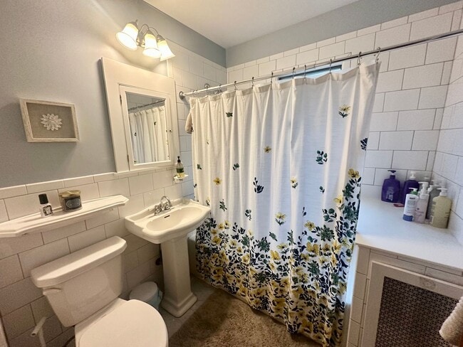 Building Photo - Spacious 3-Bedroom w/ Sundeck & In-Unit Laundry!