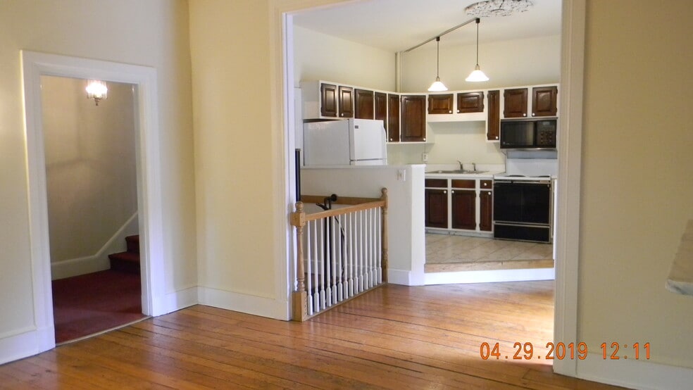 Living room toward kitchen - 311 N High St