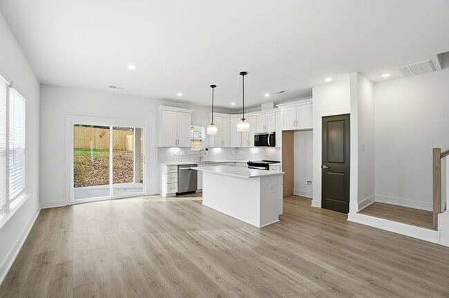 Building Photo - Bright & Modern New Construction Townhome