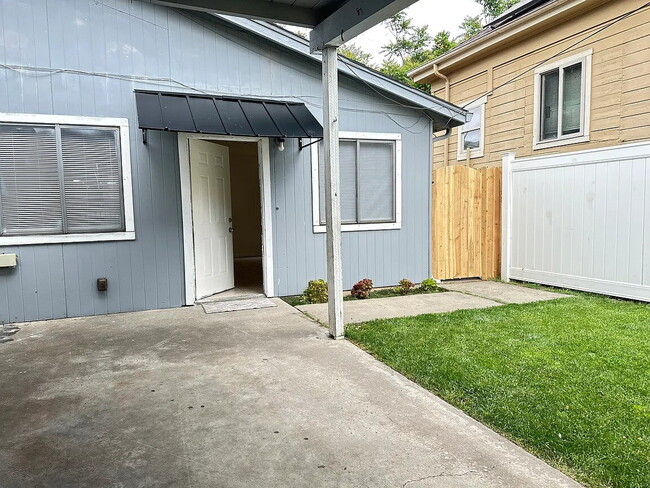 Building Photo - Fresh interior paint, new lighting fixtures, large living room, hall with laundry hook ups.