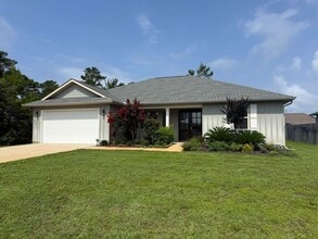 Building Photo - Gulf Breeze - 4 bedroom, 2.5 bathroom - lawn care included