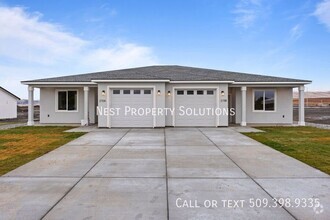 Building Photo - Available Now: New Construction Duplex Clo...