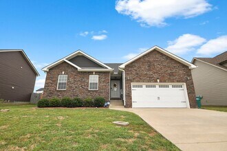 Building Photo - Pet Friendly Three Bedroom with Bonus!