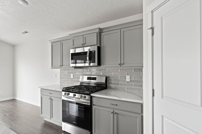 Building Photo - 10419 Rockaway Ridge St