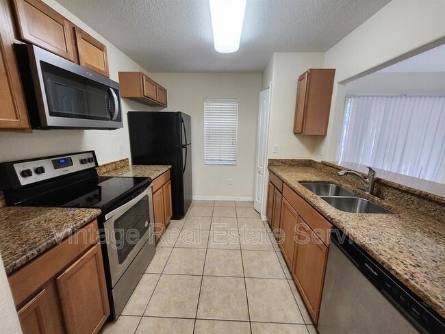 Building Photo - 10932 Keys Gate Dr