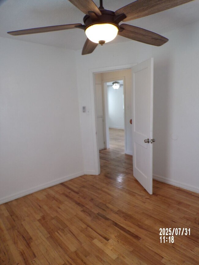 Building Photo - NEW listing-refinished hardwood floors, new laminate and paint throughout