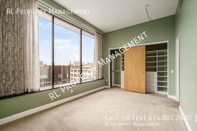 Building Photo - Beautiful 2 bedroom 1.5 bathroom condo in ...