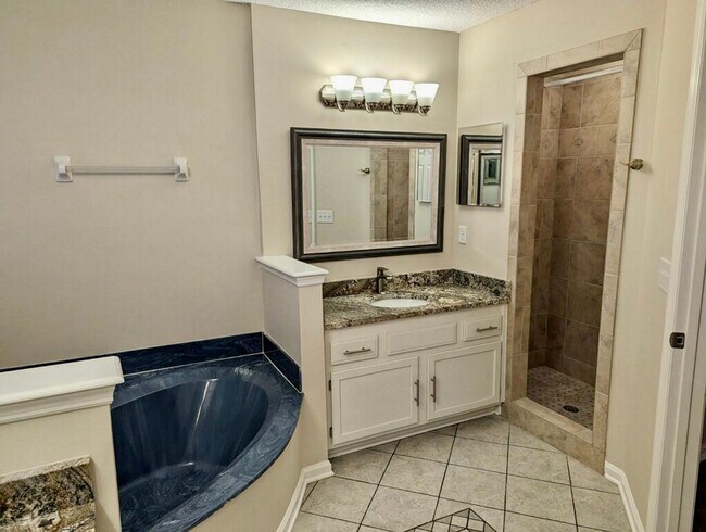 Building Photo - Behind the Gates: A Corner-Lot 4 bedroom, 2 bath Retreat in Coveted Pace Island!!