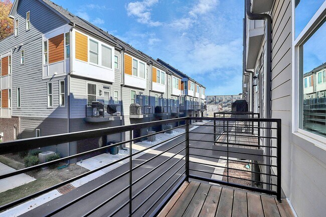 Building Photo - LoSo Terrace like new townhome available f...