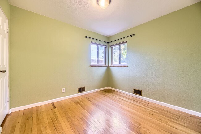 Building Photo - Spacious Home w/Large Backyard Only Blocks...