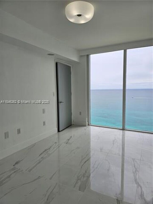 Building Photo - 19111 Collins Ave