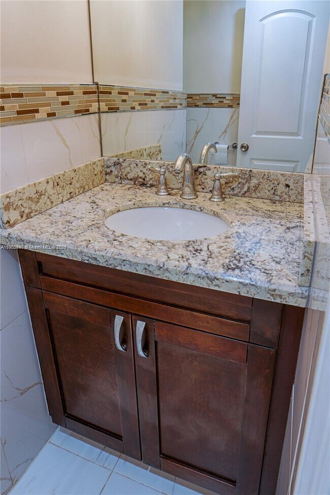 Building Photo - 10185 Collins Ave