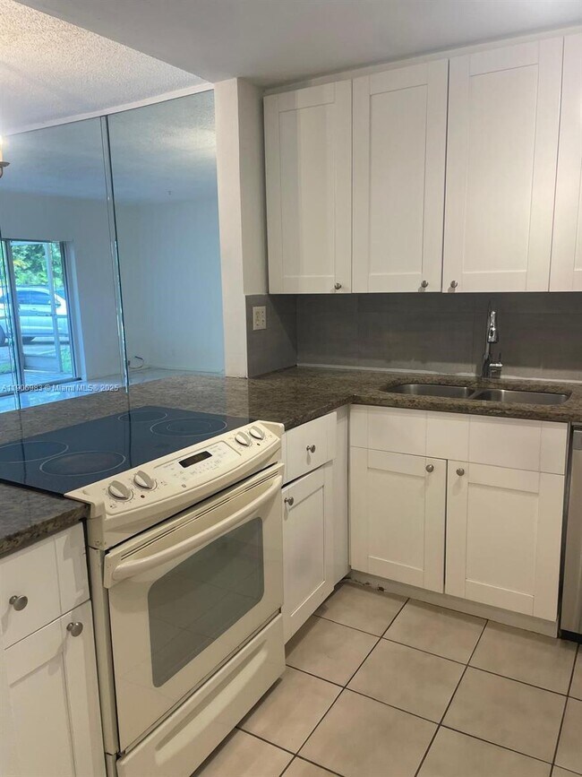 Building Photo - 4384 NW 9th Ave