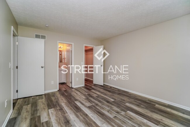 Building Photo - REDUCED- Now offering $1000 off first full...