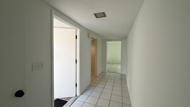 Building Photo - All inclusive 2BR/ 2B Condo in 55+ Community