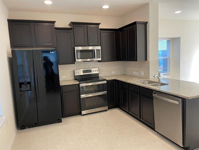 Building Photo - 9610 Morning Iris Dr