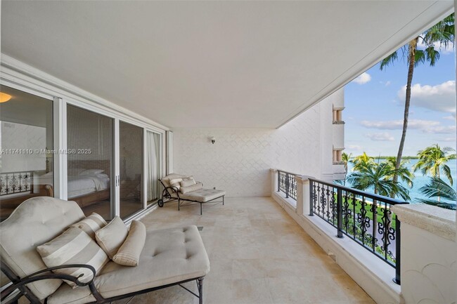 Building Photo - 5235 Fisher Island Dr