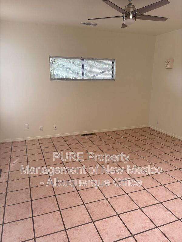 Building Photo - 8220 W Raintree Dr NE