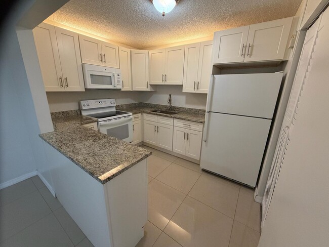 Building Photo - 5930 Whispering Pine Way