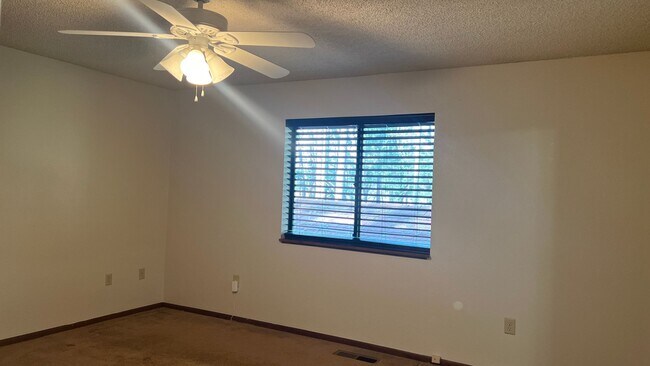 Building Photo - Two Bedroom Two bath home with attached Ga...