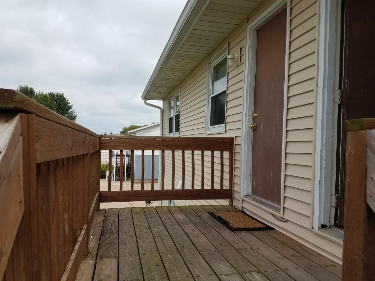 small deck area with stairs to parking - 775 Dilenbeck Dr