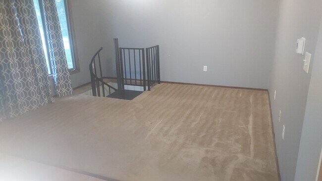 Spiral staircase to lower family room - 819 Moore St