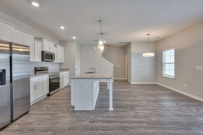 Building Photo - Brand New Luxury Townhome! 3 BR, 2.5 BA, 2 Car Garage, Pool, Dog Park, and More!