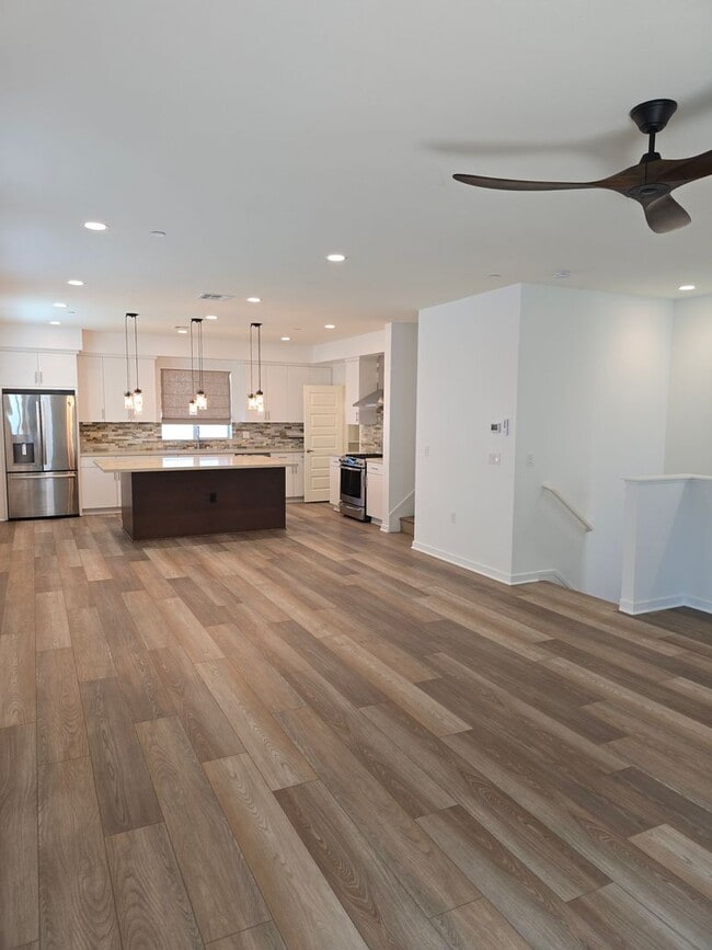Building Photo - Breathtaking 4-bedroom, 3.5-bathroom townh...