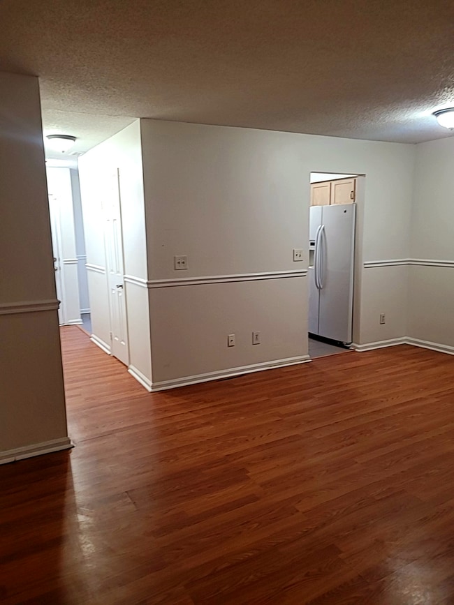 Building Photo - Spacious 3BR Townhome • $2,150 • Fenced Yard + Bonus Room • Prime Location