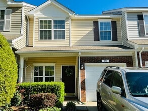 Building Photo - Two bedroom townhome with one car garage