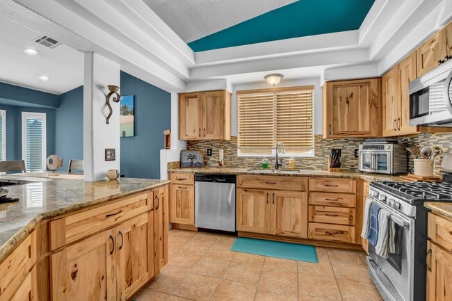 Building Photo - Coastal-Inspired Single-Story with Pool, Spa & Rare Gated Parking