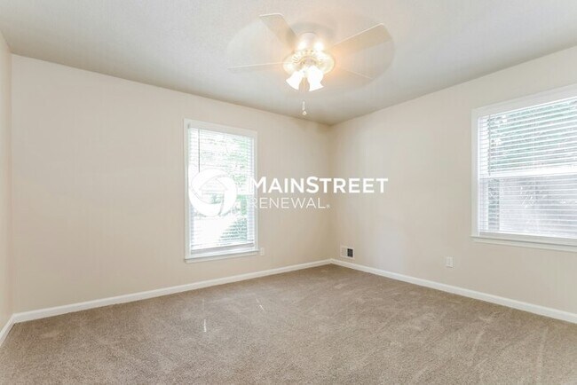 Building Photo - 5 Bedroom Pet-Friendly Home in JONESBORO, GA with Main Street Renewal