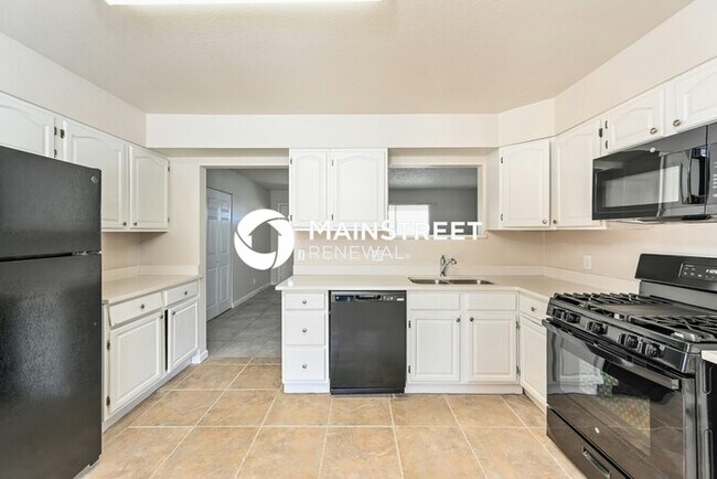 Building Photo - 4 Bedroom Pet-Friendly Home in DENVER, CO with Main Street Renewal
