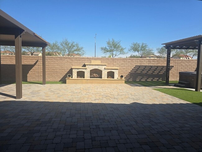Building Photo - Five-bedroom CASITA home with a three-car ...