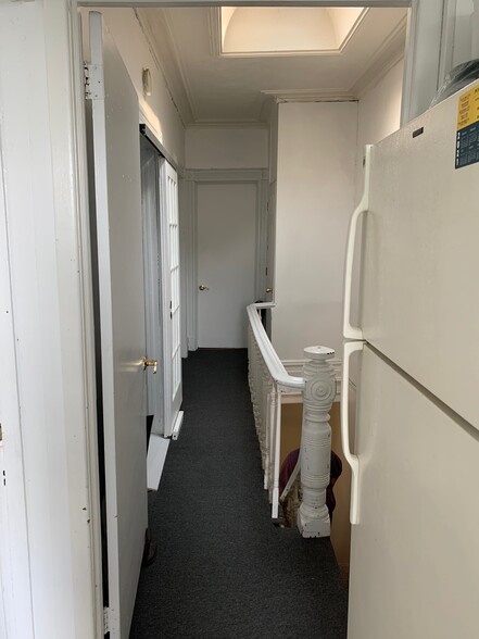 Private hallway with skylight and access to all rooms. - 292 Jefferson Ave