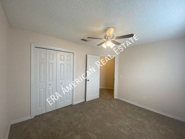 Building Photo - 7418 Woodmont Rd